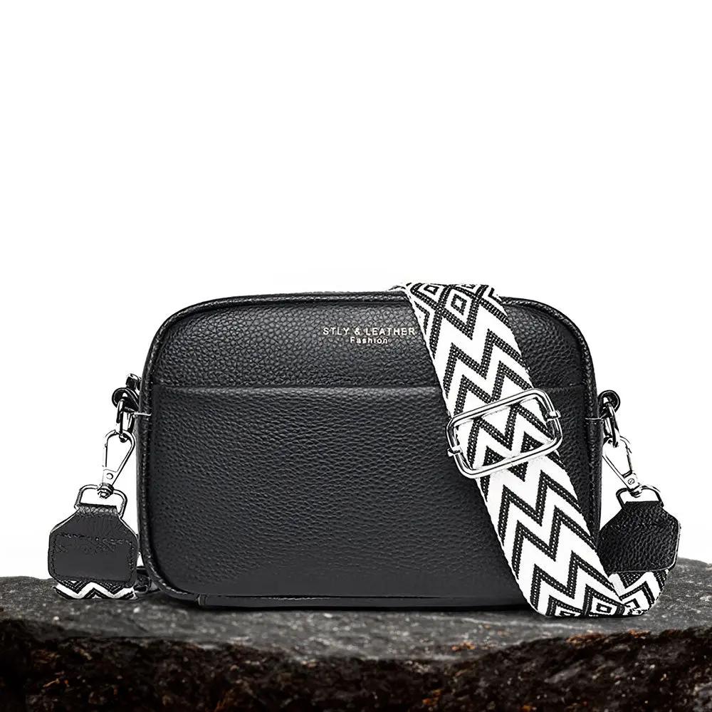 Sac à bandoulière noir pour femmes Mira de Danoir Paris, élégant et sophistiqué, avec poignée et détails en cuir.