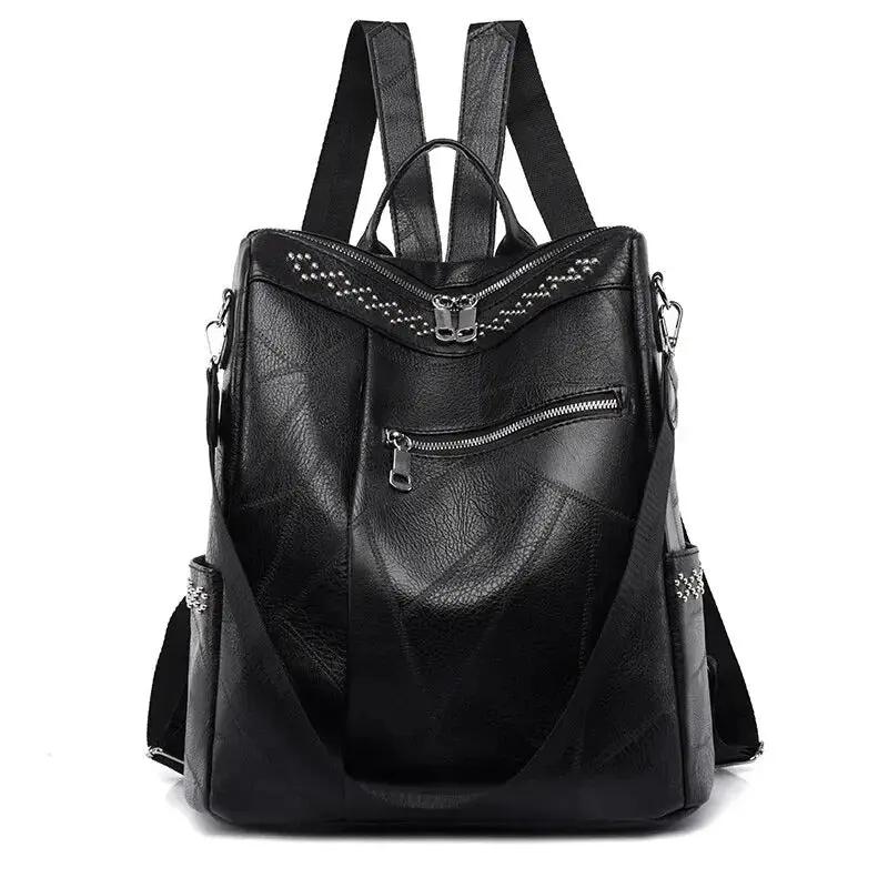 Sac à dos rétro-chic Pauline de Danoir Paris en cuir noir avec détails élégants, vue de face.