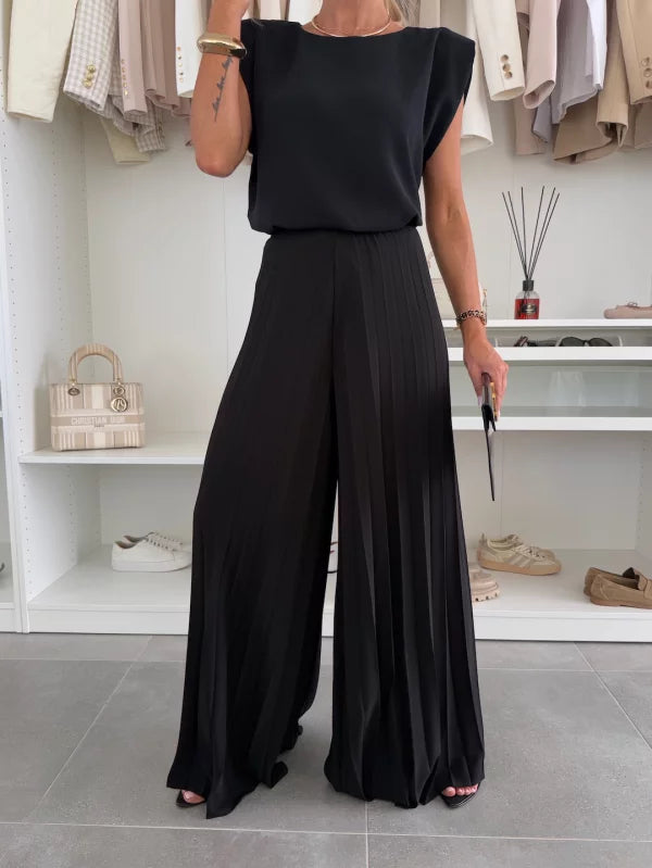 Blouse noire en viscose Danoir Paris, élégante et confortable, avec coupe chic et détails raffinés.