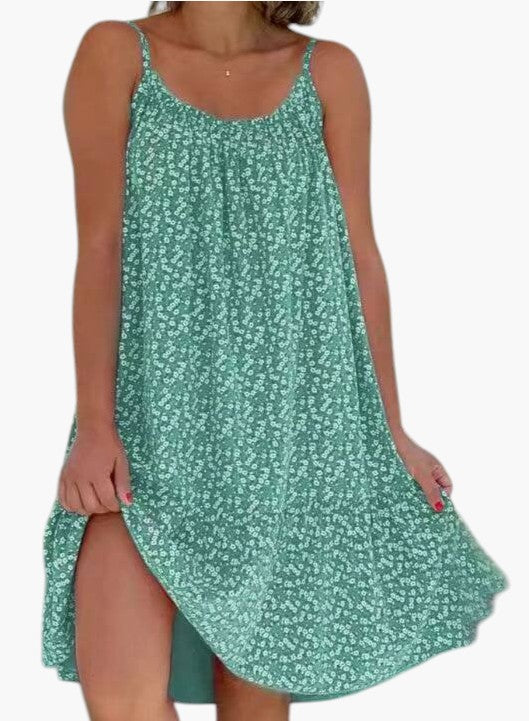 Robe légère Rosalie™ à imprimé délicat pour l'été, vêtement fluide et élégant de la marque Danoir Paris.