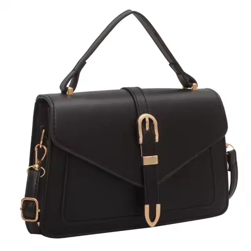 Sac à bandoulière noir Danoir Paris Tessa, sac élégant et minimaliste en cuir, avec poignée et fermeture discrète.