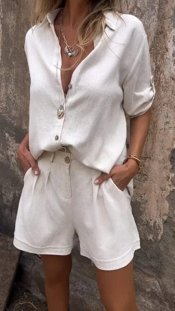 Ensemble chic décontracté Riviane de Danoir Paris en orange, avec veste et pantalon élégants et confortables.