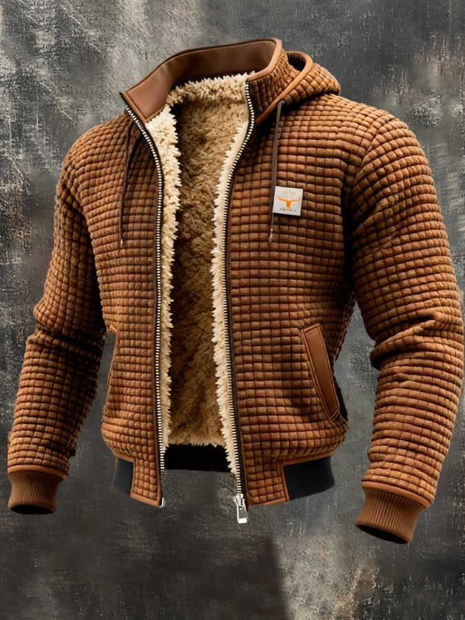 Veste d'hiver matelassée Danoir Paris avec intérieur sherpa, style chaud et confortable, tissu noir et coupe moderne.