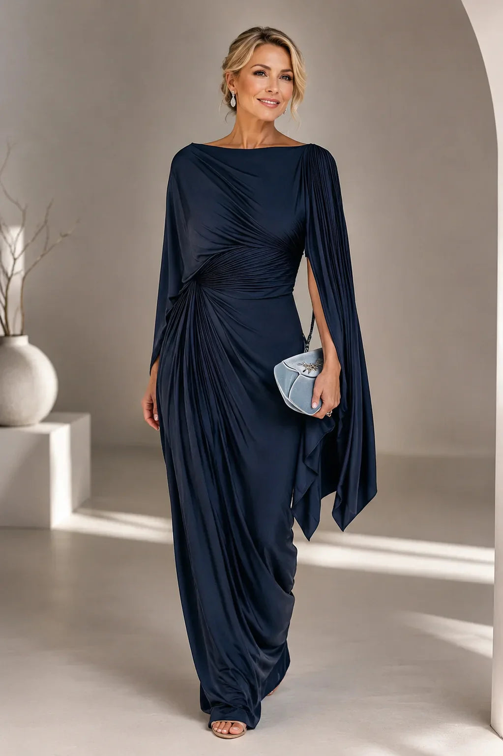 Robe longue plissée Lyssa de Danoir Paris en tissu rose, vêtement élégant avec des détails fluides et sophistiqués.