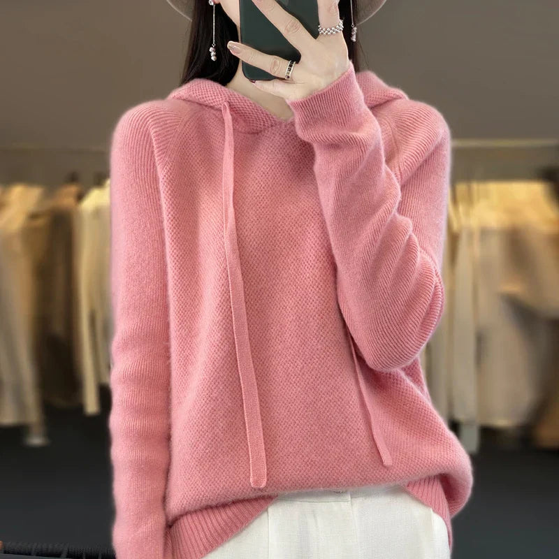 Hermine Douce Hivernale en Merinoull Danoir Paris, pull chaud rose avec motifs élégants pour l'hiver.