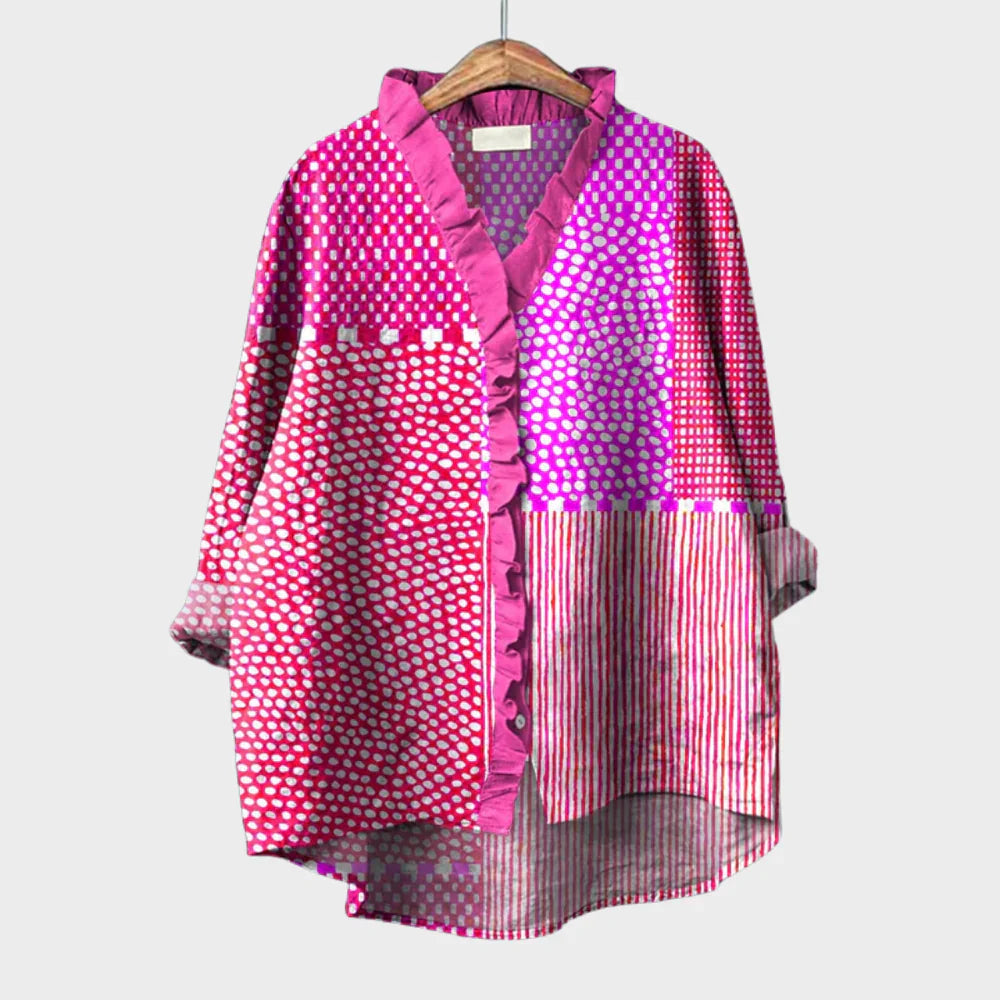Blouse d'été élégante Cassandra de Danoir Paris en tissu rouge et violet, portée sur mannequin blanc.