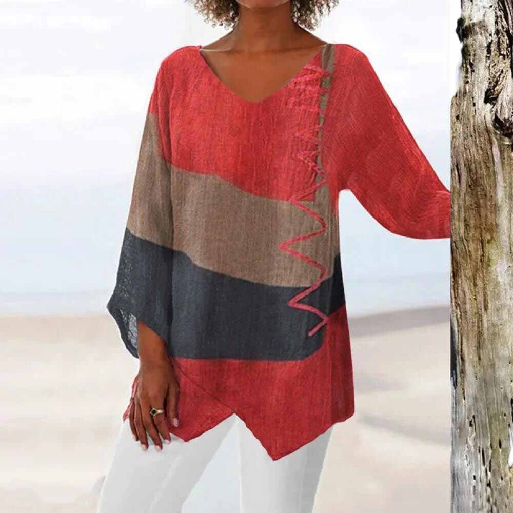 Chemisier chic polyvalent rouge Danoir Paris, style élégant et moderne, en tissu léger, porté avec manches longues.