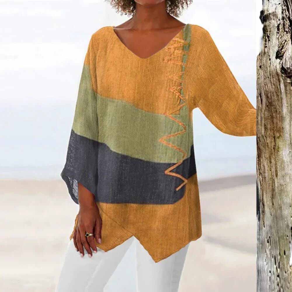 Chemisier chic polyvalent Aurelia de Danoir Paris en tissu rouge avec col et manches longues, porté sur un mannequin.