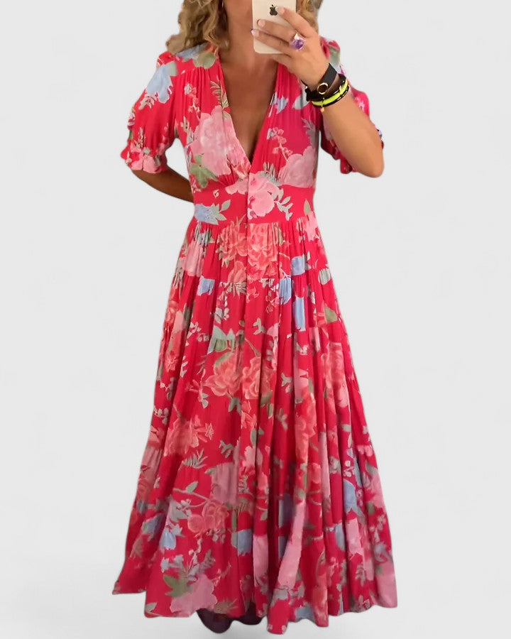 Robe fleurie col en V de la marque Danoir Paris, motif floral coloré, coupe élégante et légère.