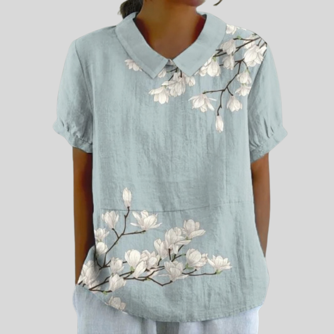 Blouse fleurie Aurore de Danoir Paris avec motifs floraux, coupe élégante et tissu léger, vue de face.