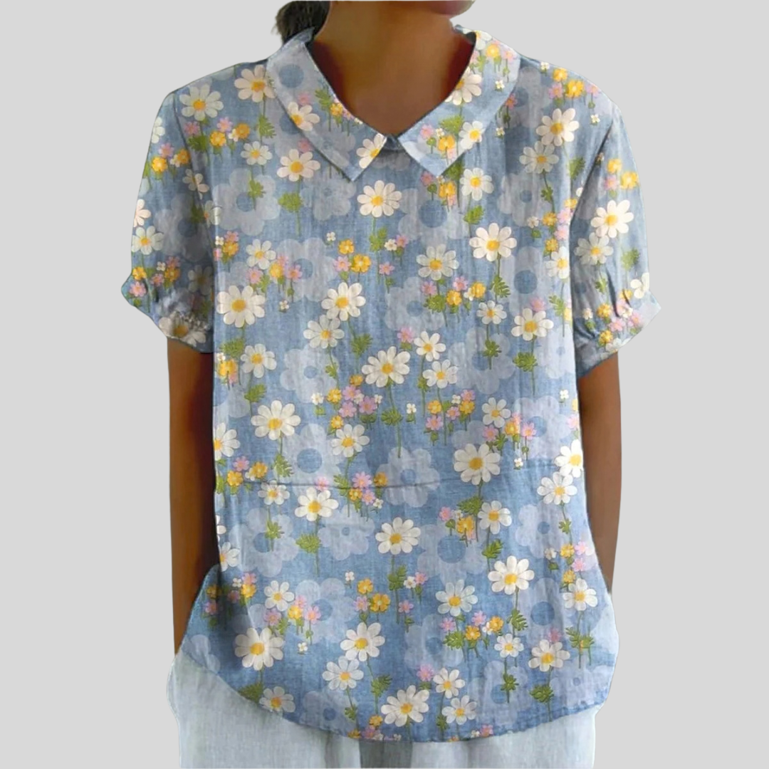 Blouse Coralie Danoir Paris avec motifs marguerites fraîches en coton léger, manches longues et col en V.