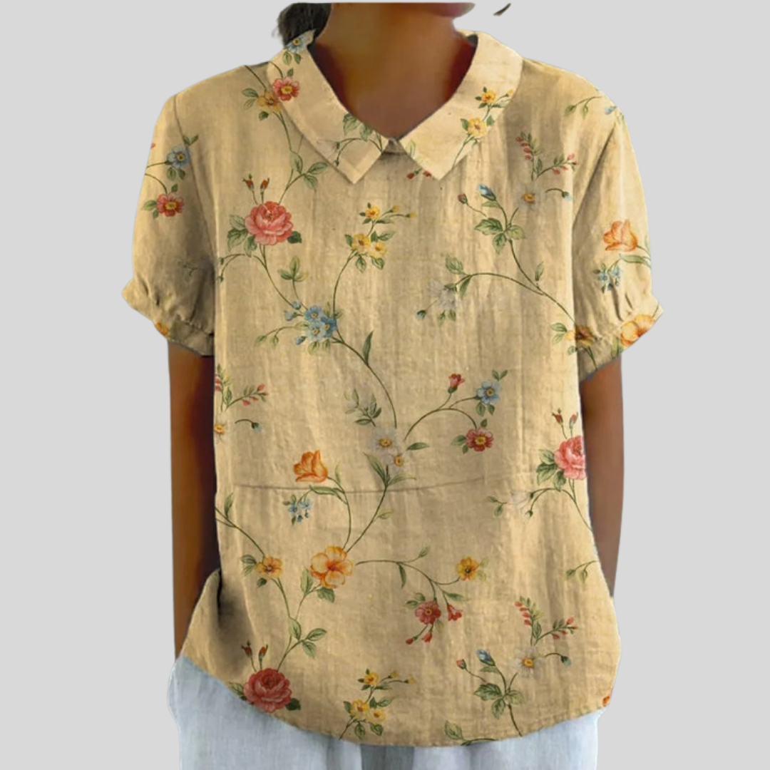 Blouse vintage à fleurs Margot de Danoir Paris, motif floral coloré, col boutonné et manches longues.