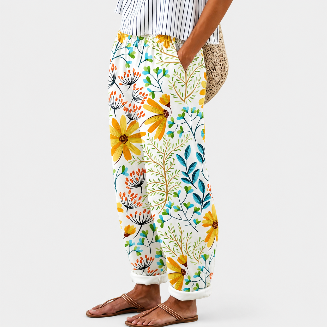 Pantalons Confort Jardin Fleuri Danoir Paris, pantalon léger avec motif floral, tissu confortable pour l'été.