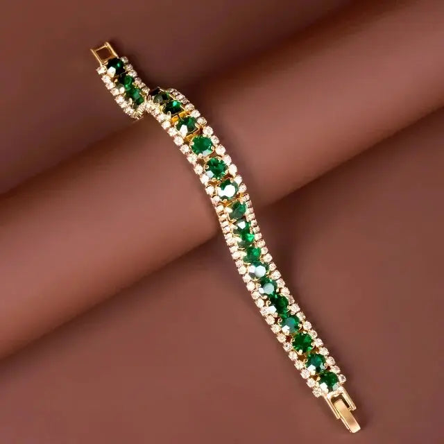 Bracelet vert et or Danoir Paris, taille unique, en métal avec finition élégante, porté sur un poignet.