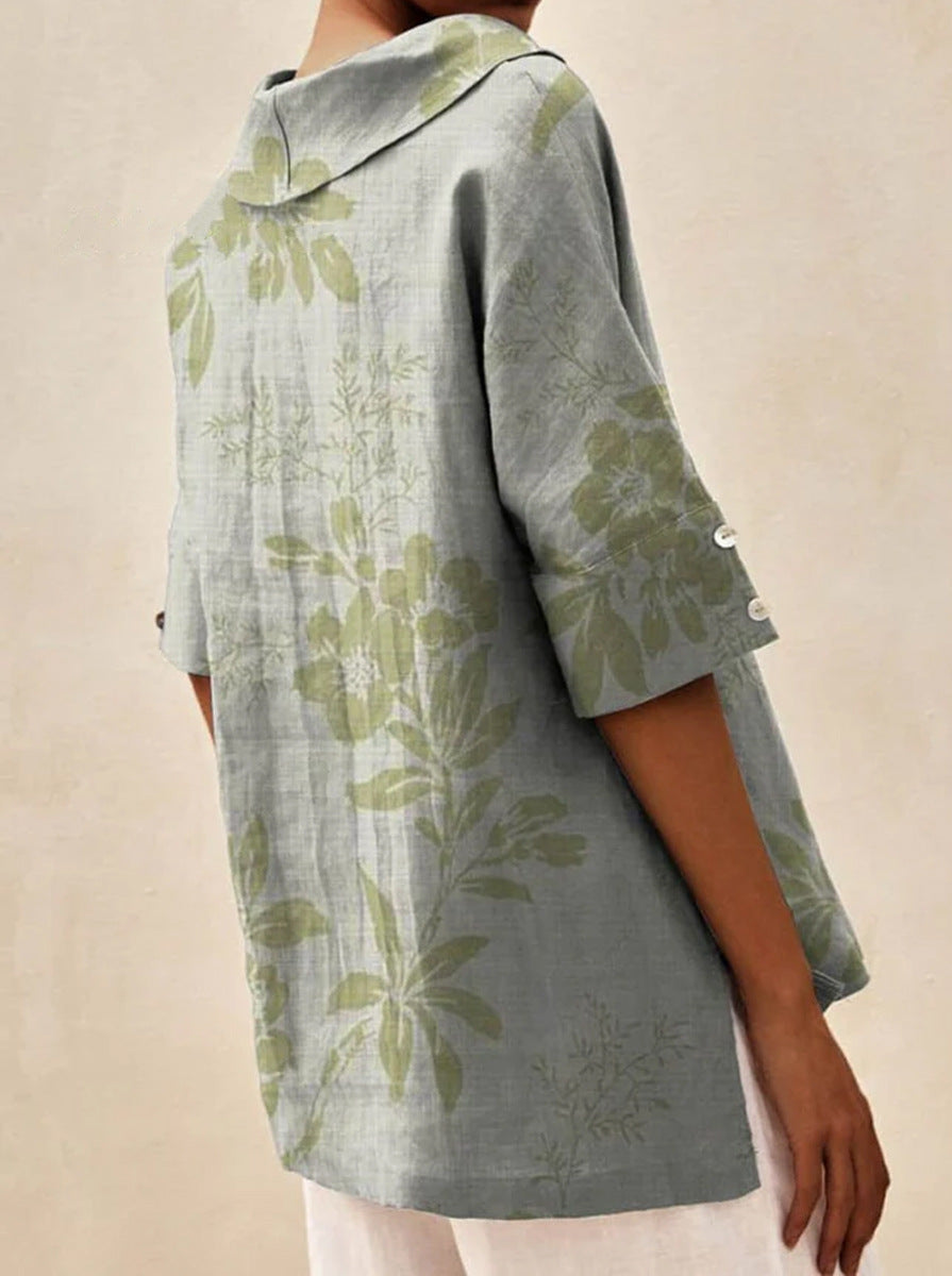 Haut léger floral estival Andrea de Danoir Paris, blouse blanche avec motif floral, manches courtes et style léger.