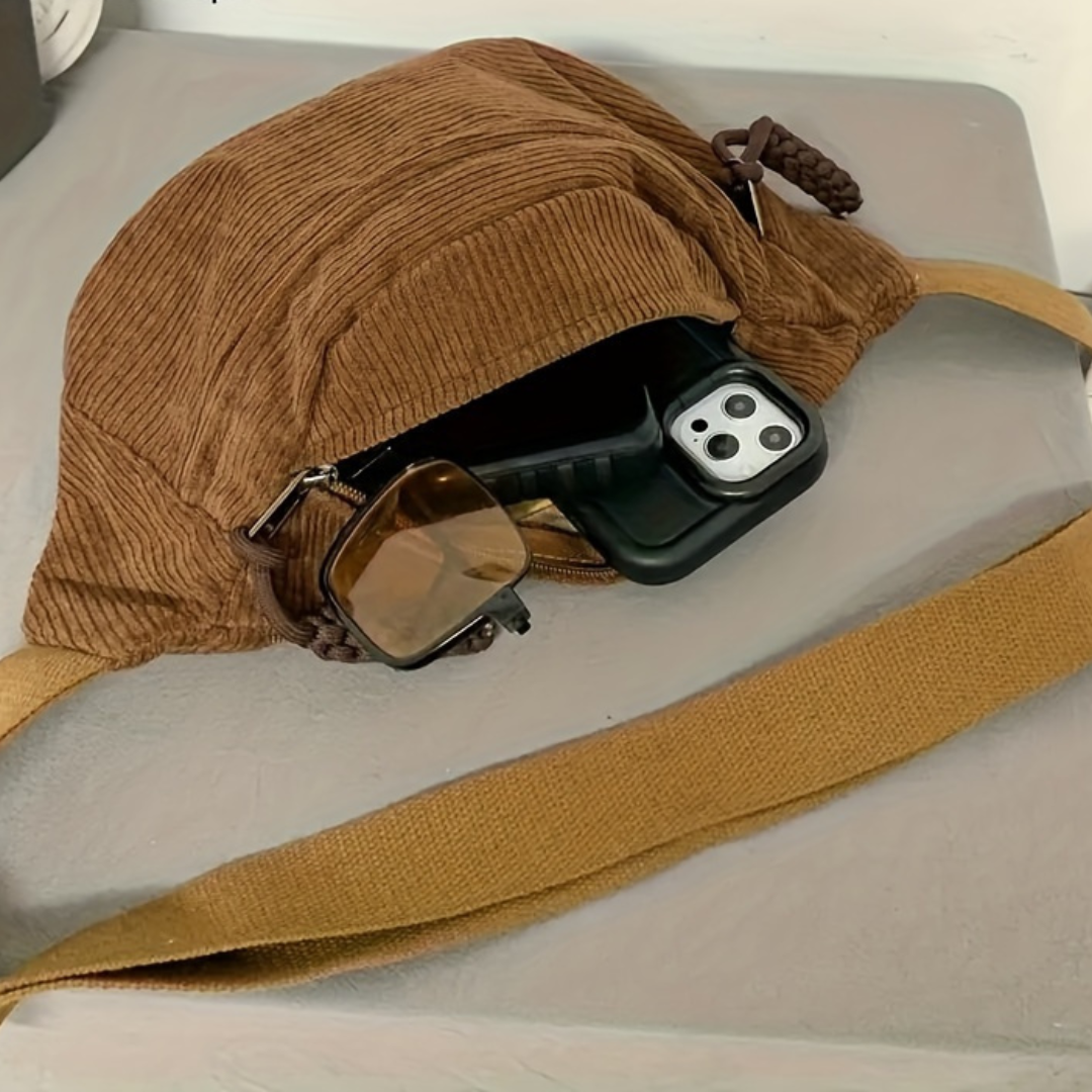 Sac à épaule Danoir Paris Petra en velours côtelé, avec bandoulière et détails texturés, visible en image.