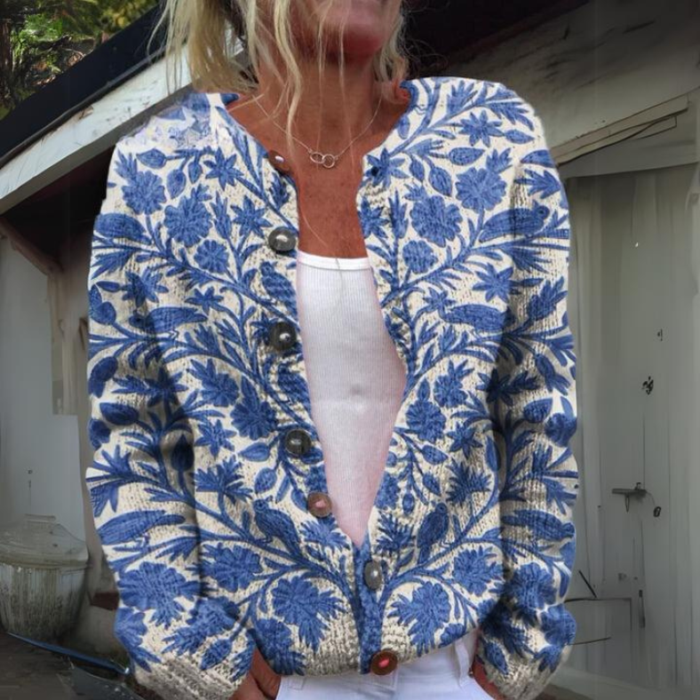 Cardigan floral élégant Amelie de Danoir Paris en vert, avec motifs floraux et détails raffinés pour femme.