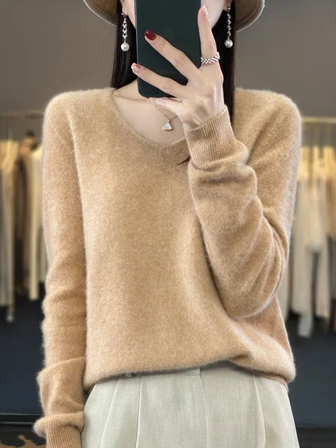 Pull douillet vert Danoir Paris Elena, élégant et confortable, avec un design chic et sophistiqué.