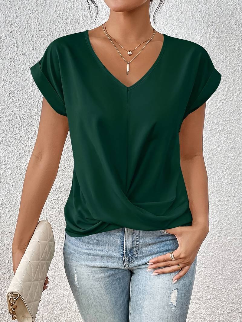 Chemisier chic polyvalent Julie de Danoir Paris, vert avec manches longues et détails élégants, porté sur mannequin.