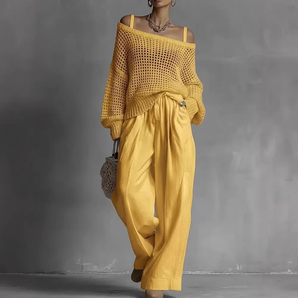 Ensemble deux pièces Claribel™ élégant de Danoir Paris, comprenant un haut et un pantalon en tissu fluide, porté sur un mannequin.