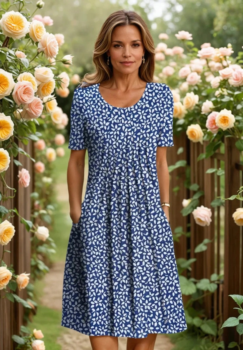 Robe midi élégante et aérée pour femmes Danoir Paris, tissu fluide, design sophistiqué, idéale pour une tenue chic.