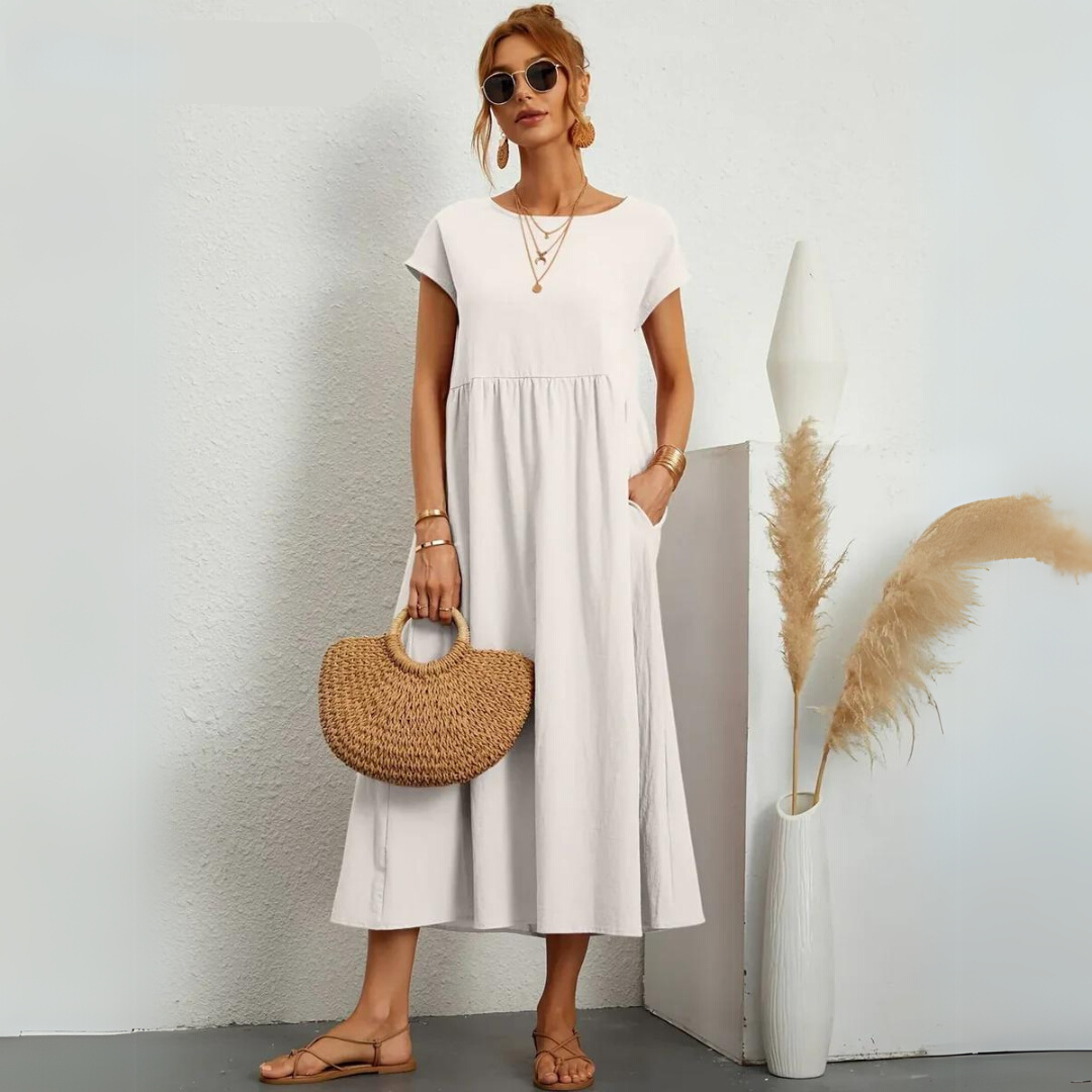 Robe midi décontractée en coton Isla pour femmes, fabriquée par Danoir Paris, avec coupe fluide et style confortable.