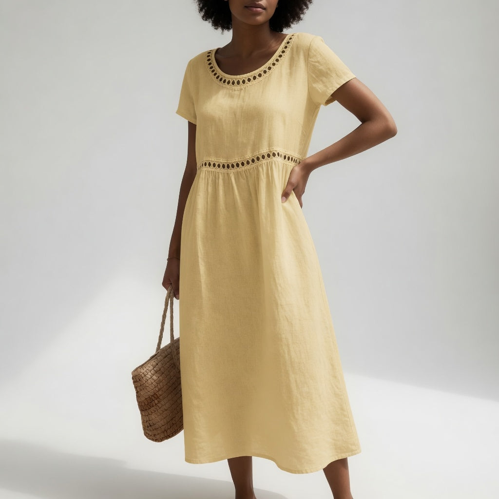 Robe femme noire Danoir Paris Livia avec broderies élégantes, manche longue et coupe fluide, parfaite pour toutes occasions.