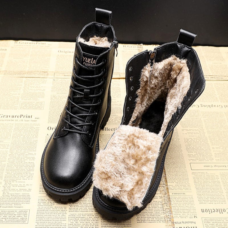 Bottes d'hiver doublées à boucle Delphine de Danoir Paris, en cuir noir avec détails de boucle, pour femme.