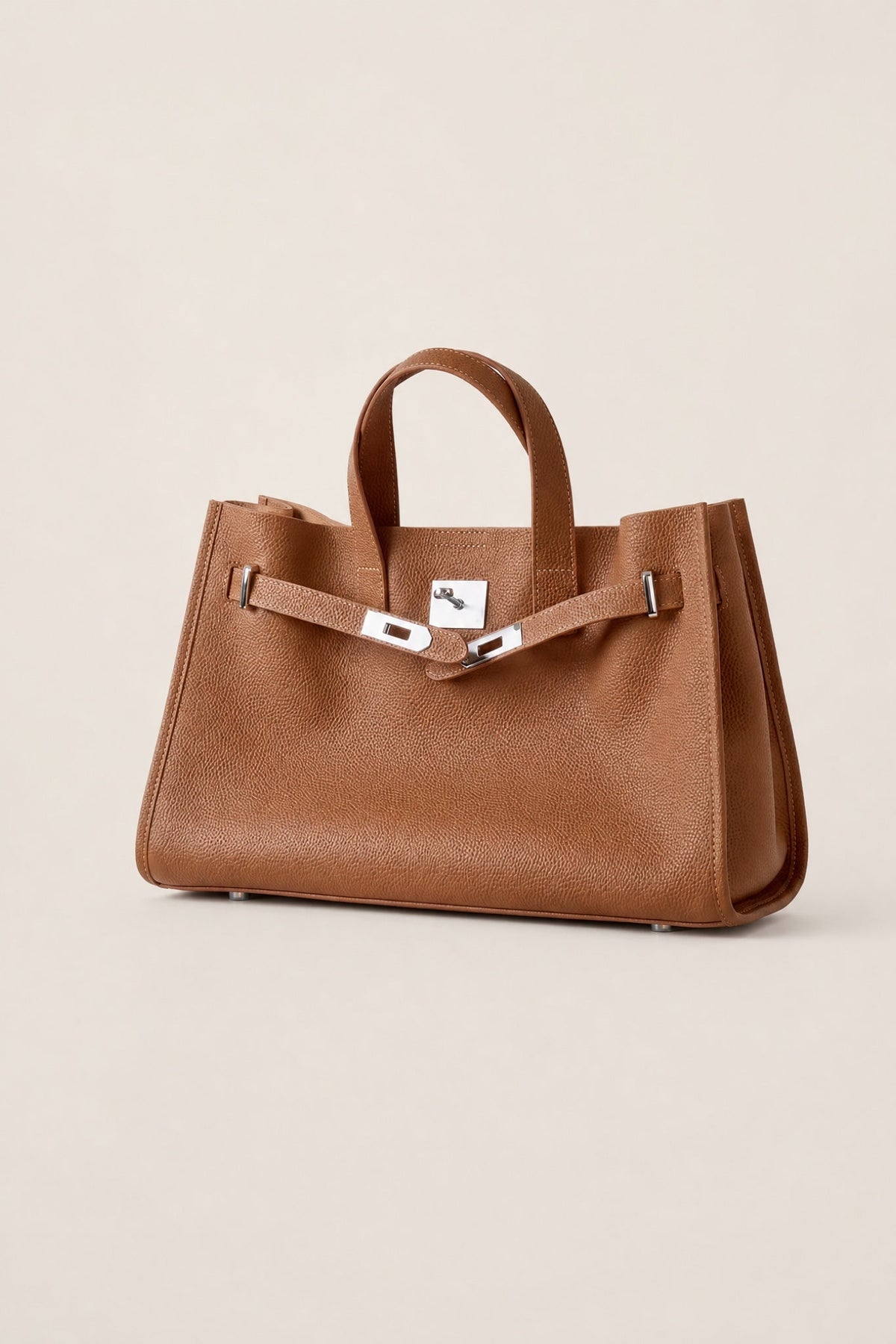 Sac tote Meridian Danoir Paris en cuir marron avec poignées robustes et espace intérieur spacieux, vue frontale.