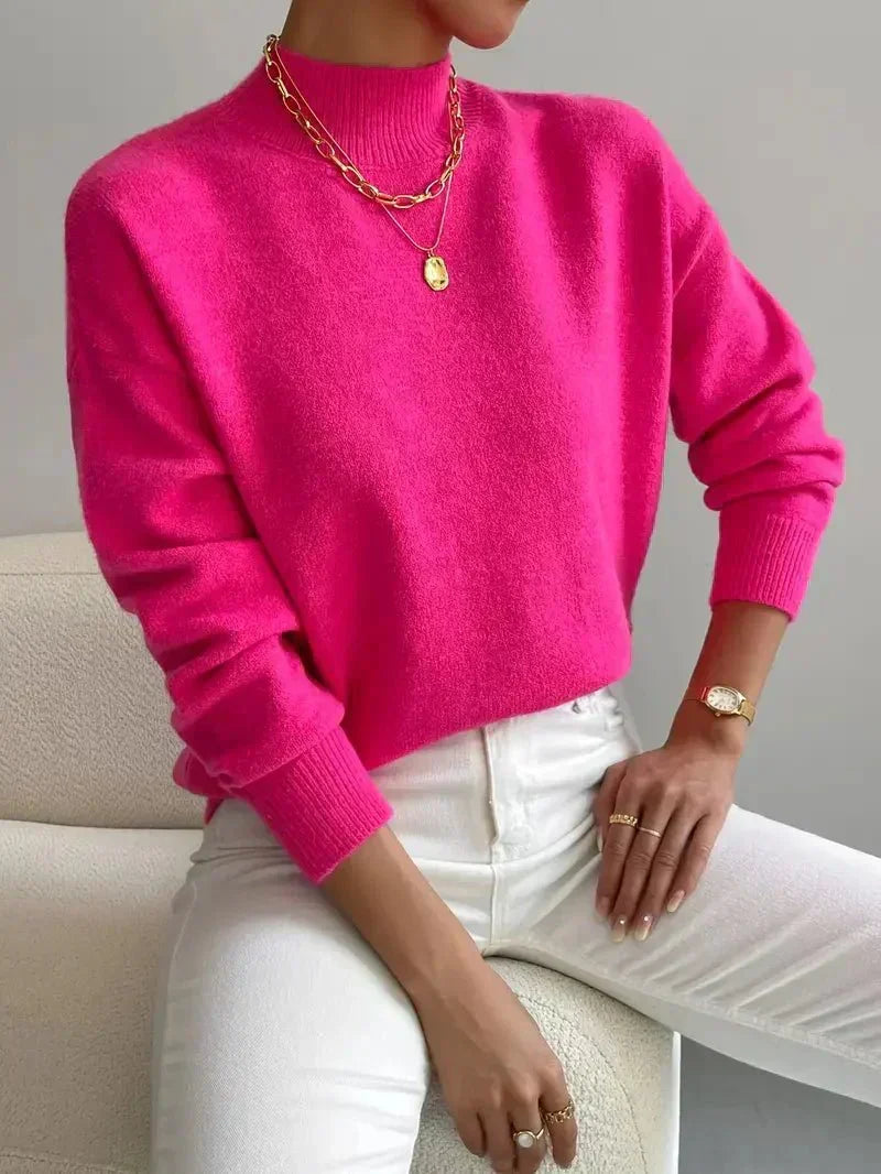 Pull élégant et chaud Jennifer de Danoir Paris, en maille confortable de couleur neutre, porté par une femme.