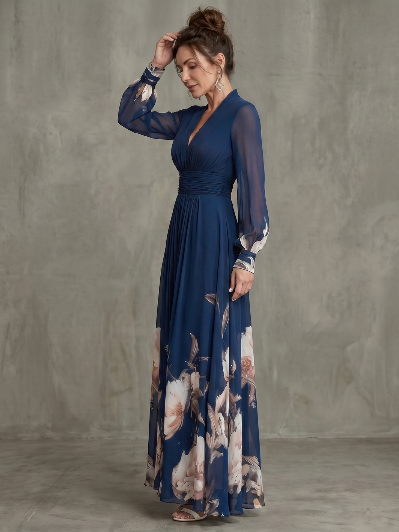 Robe maxi Danoir Paris à manches transparentes et ourlet floral, détail de la finition avec motifs floraux élégants.