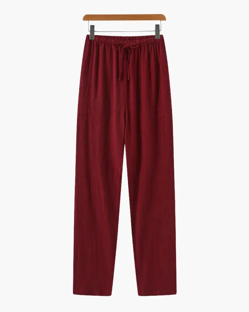 Pantalon en lin Marrakech Old Money WorldWide, coupe slim, couleur neutre, porté sur un mannequin, détails de couture visibles.