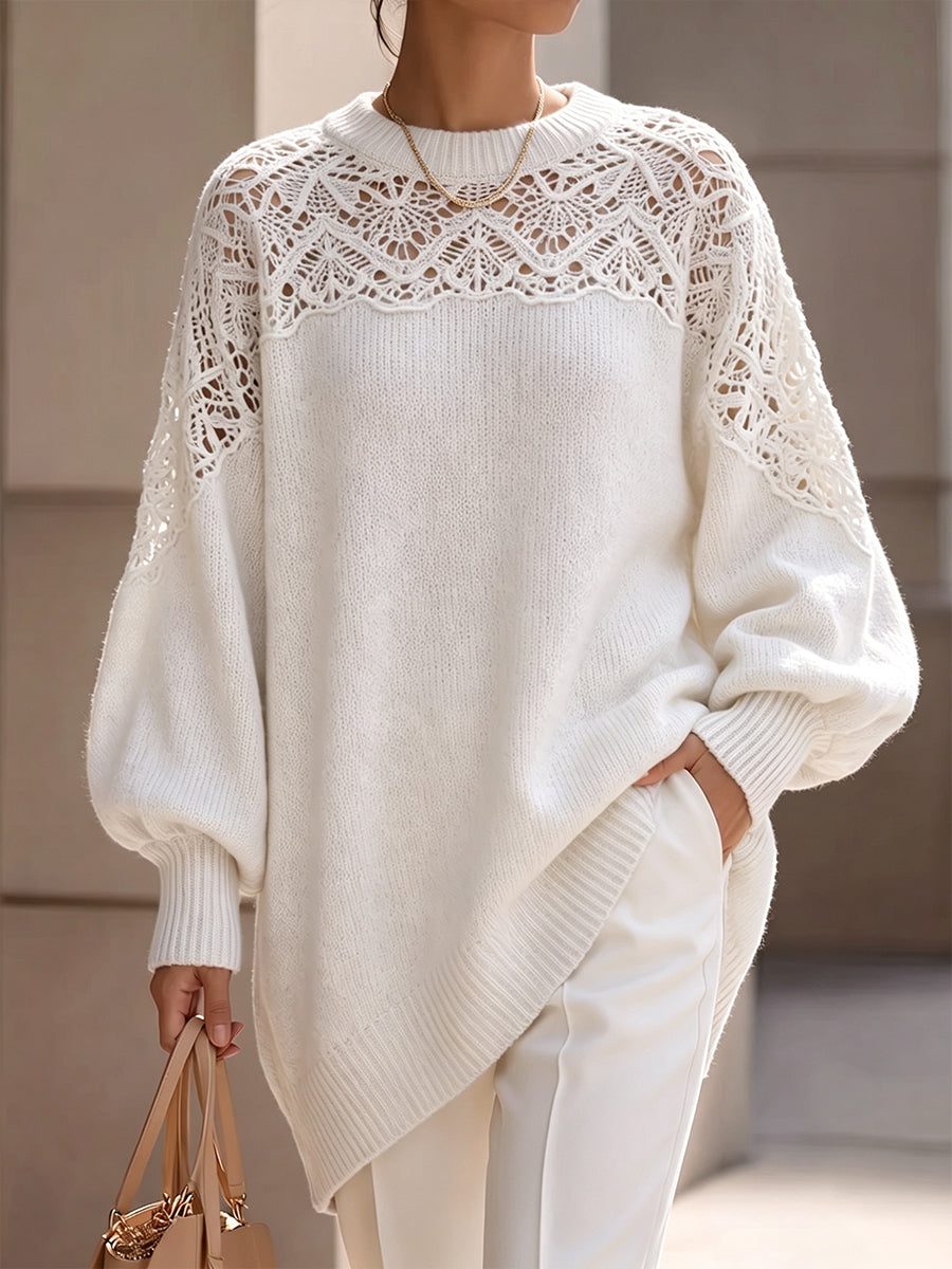 Pull tricoté oversize Danoir Paris avec yoke en crochet élégant, montrant la texture douce et le détail sophistiqué du design.