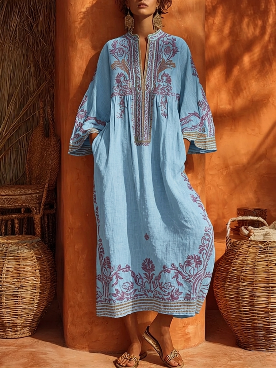 Robe longue méditerranéenne Elena™ de Danoir Paris avec motifs floraux, manches longues et coupe fluide.