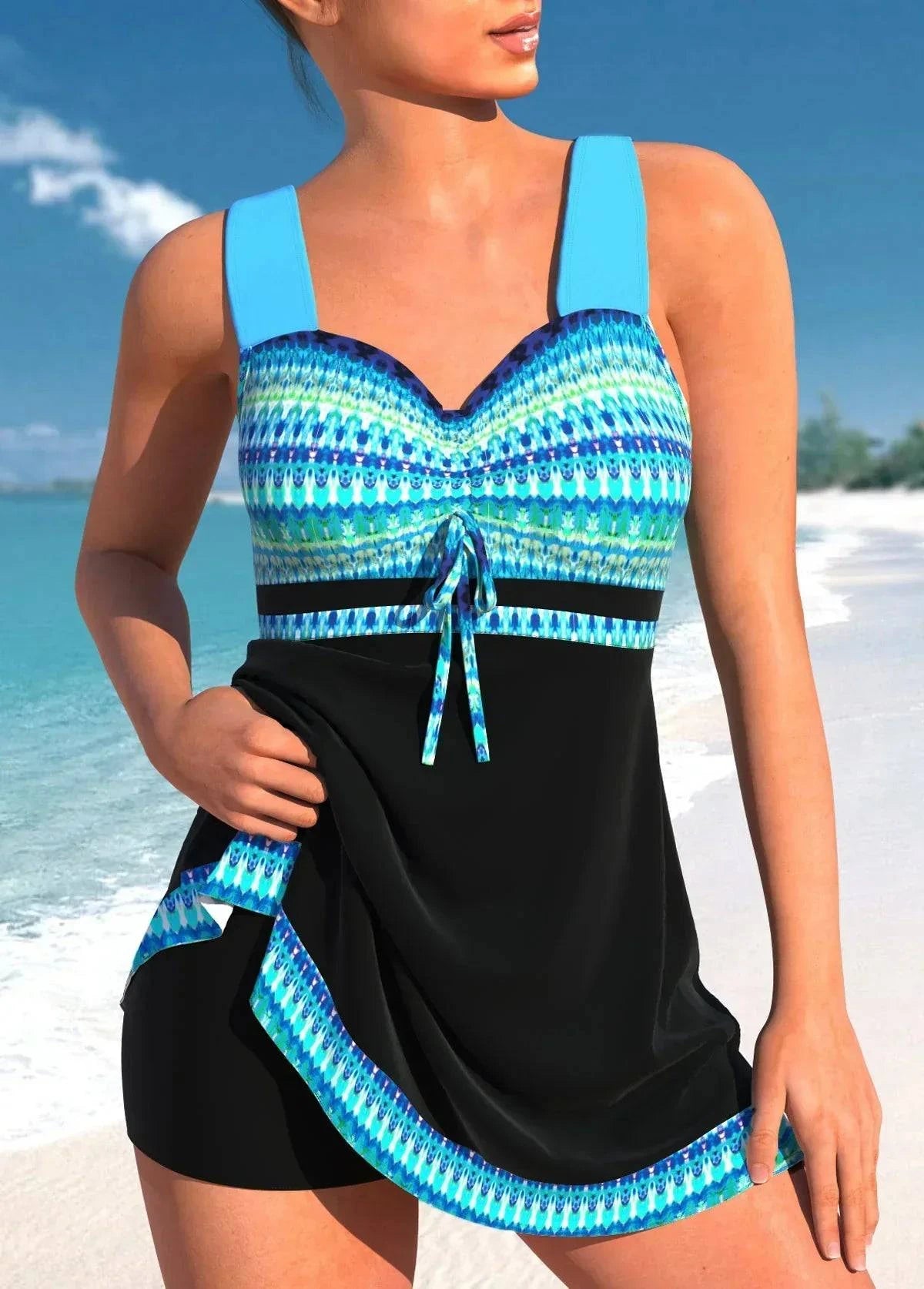 Tankini Véronique de Danoir Paris, maillot de bain élégant avec coupe confortable, en tissu bleu marine à motifs floraux.