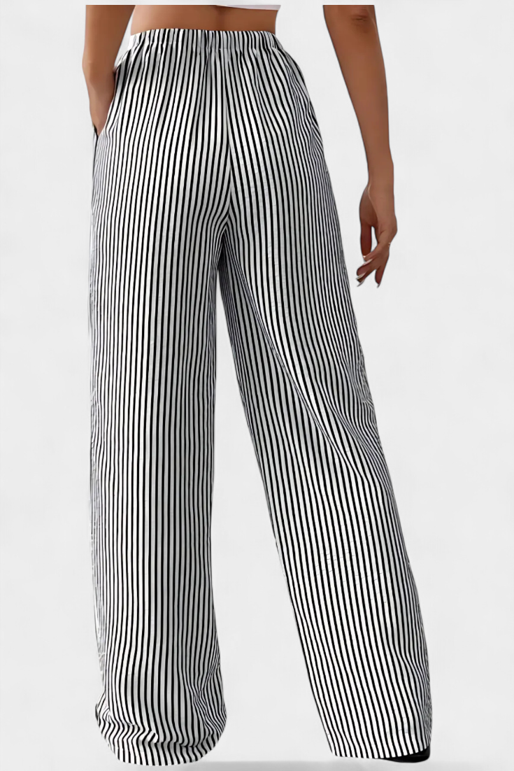 Pantalon Sabrina de Danoir Paris en tissu noir avec coupe élégante et détails modernes.
