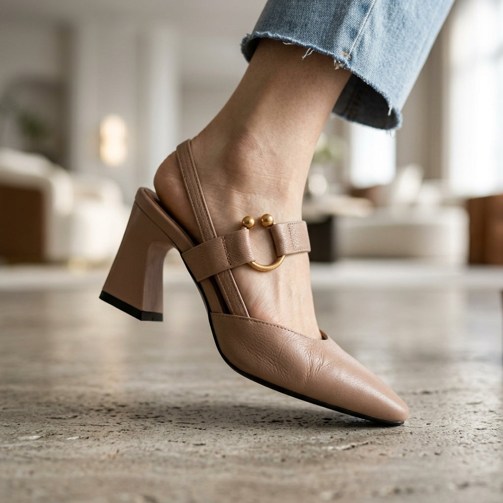 Mules à talons Danoir Paris Alana en cuir noir avec boucle élégante et semelle en cuir, vues de face et côté.