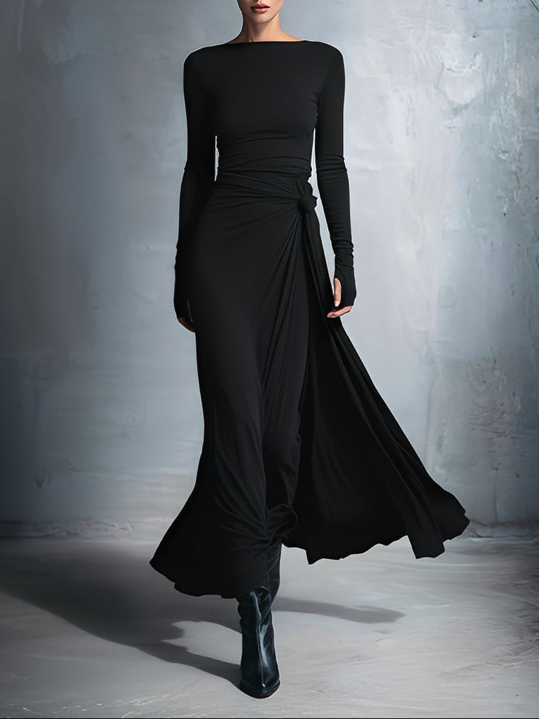 Robe maxi Naomi à Nœud Latéral de Danoir Paris, robe longue élégante avec détail de nœud sur le côté, en tissu fluide.