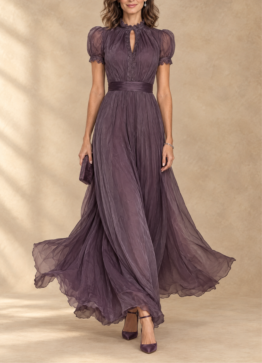 Robe maxi Danoir Paris Elia avec taille rassemblée et découpes, tissu fluide et élégance pour une silhouette raffinée.