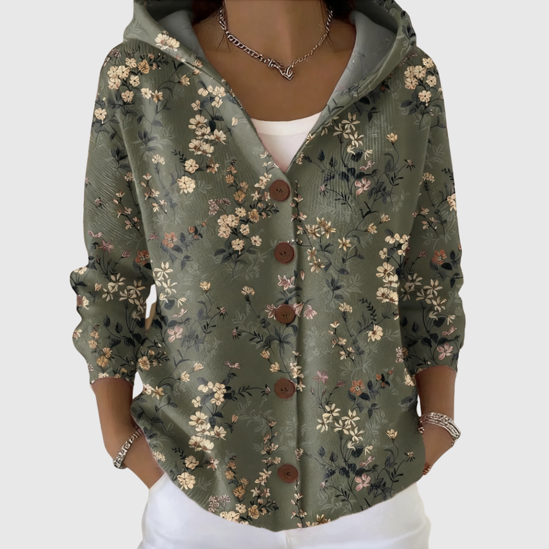 Cardigan Danoir Paris en maille avec capuche, confortable et doux, porté sur un mannequin, couleur gris clair.
