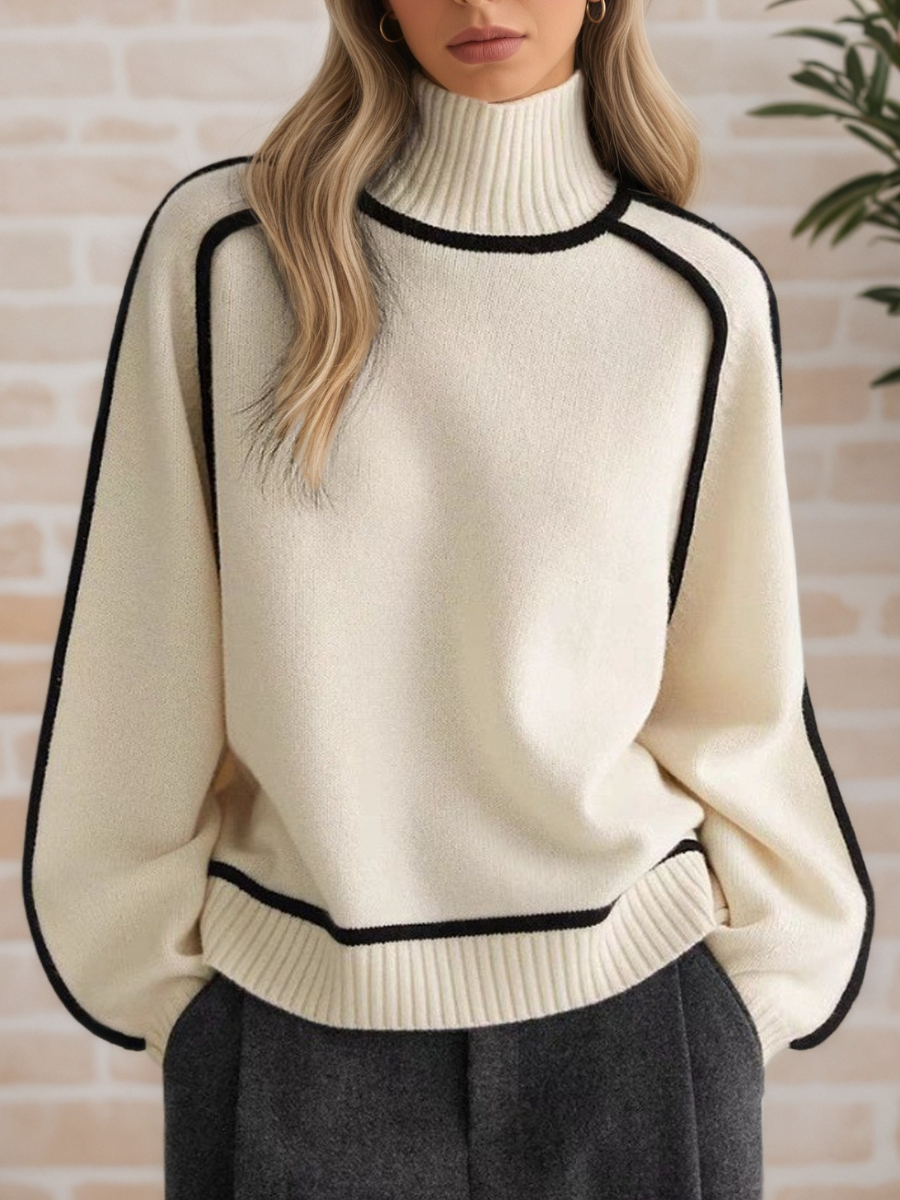 Pull élégant à col haut Donna de Danoir Paris, pull automne avec coupe raffinée, en tissu doux, porté sur mannequin.