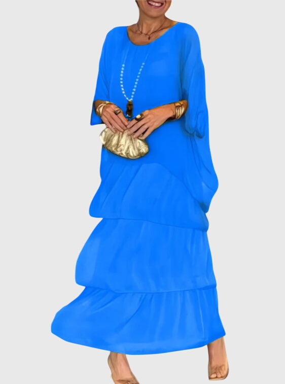 Robe longue Susan de Danoir Paris, vêtement élégant en tissu fluide, portée avec détails sophistiqués, vue de face.