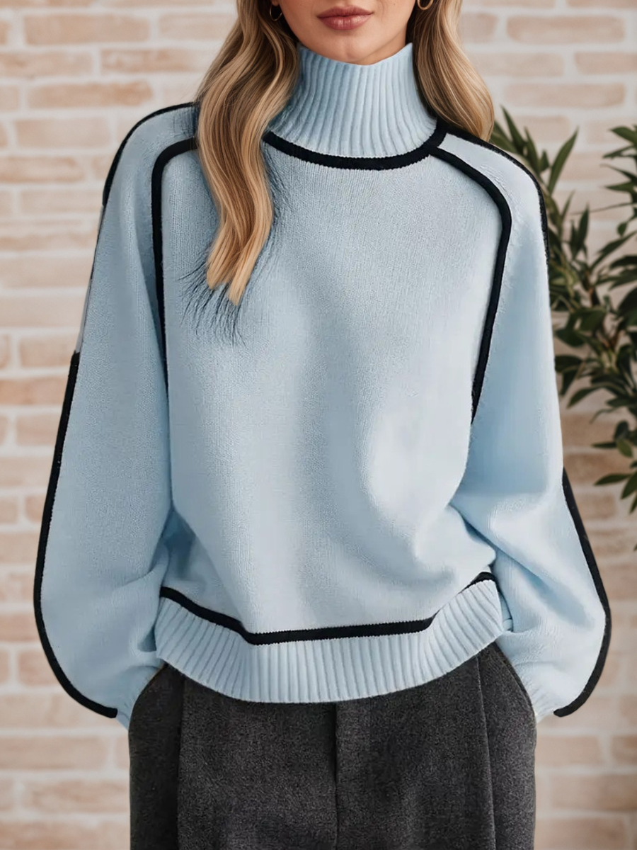 Pull Donna Danoir Paris à col haut élégant pour automne, en maille douce, porté sur mannequin avec détails de texture visible.