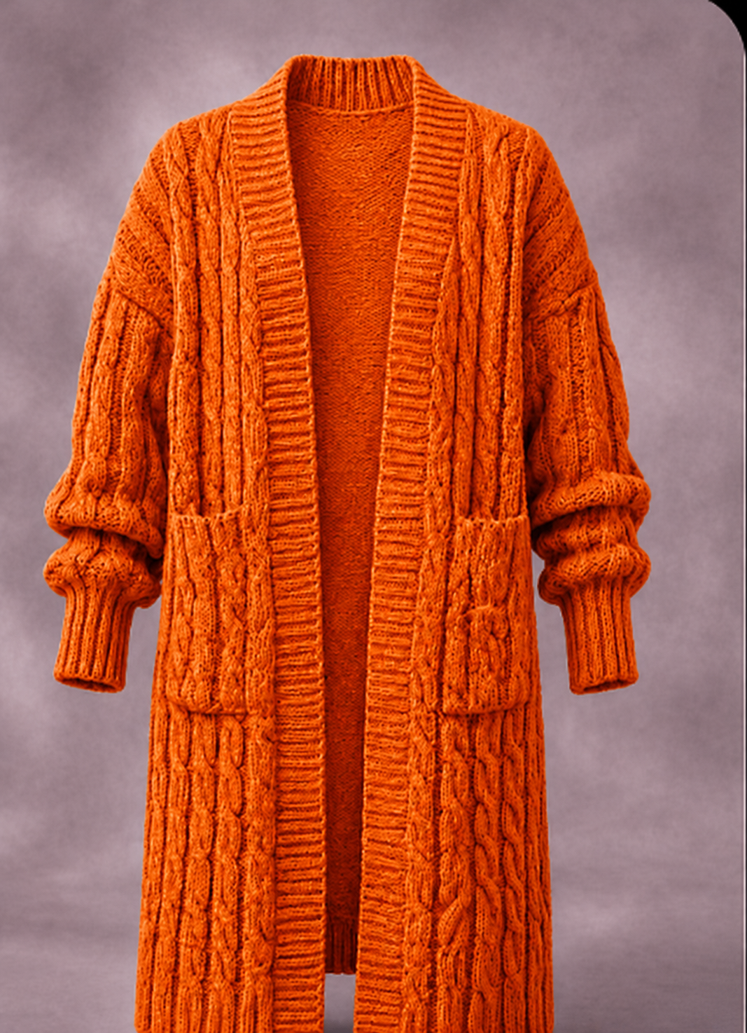 Cardigan en maille à double boutonnage Danoir Paris porté, avec col en V et manches longues, tissu doux et confortable.