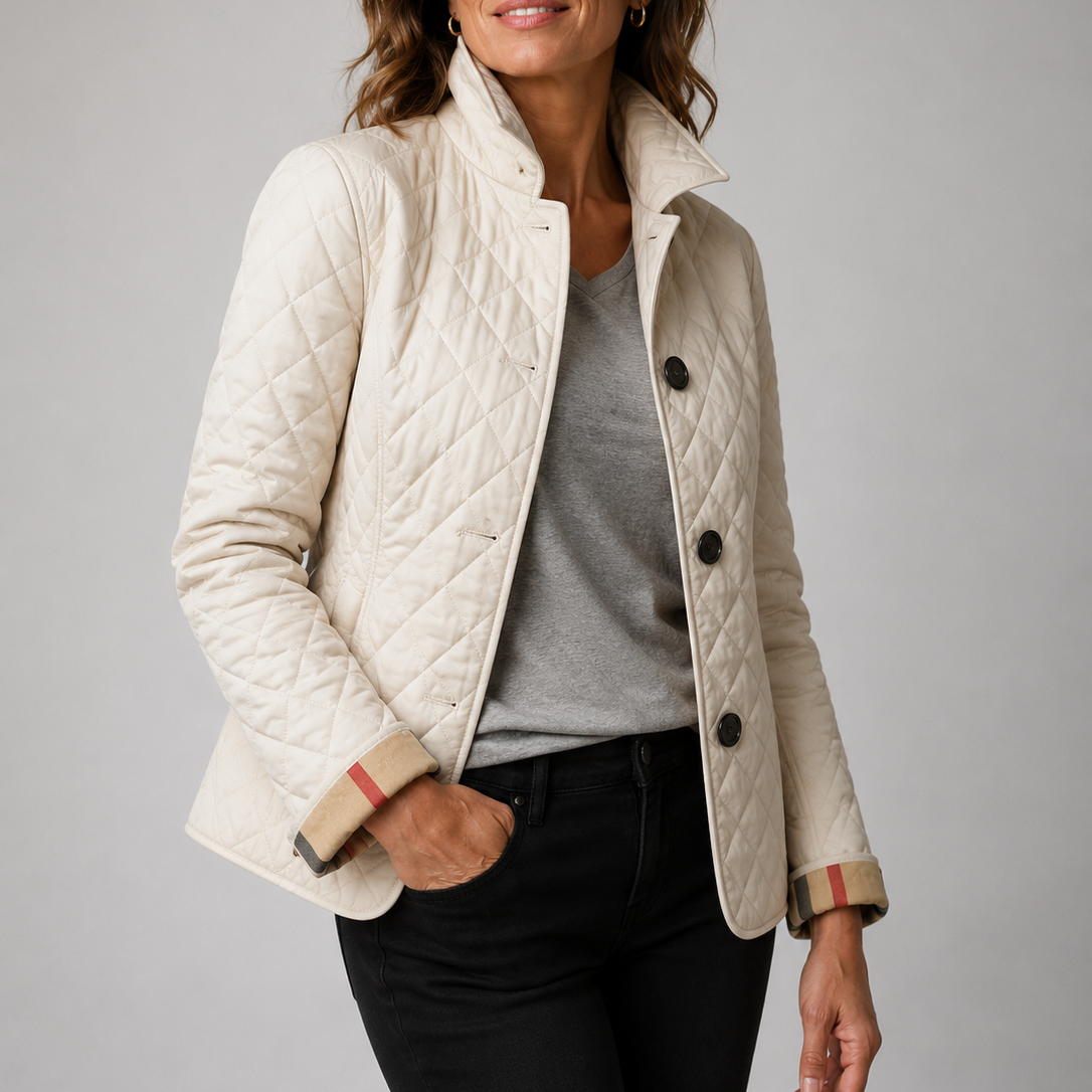 Veste matelassée légère Margot de Danoir Paris, en tissu noir avec fermeture éclair et col montant pour un style chic et chaud.