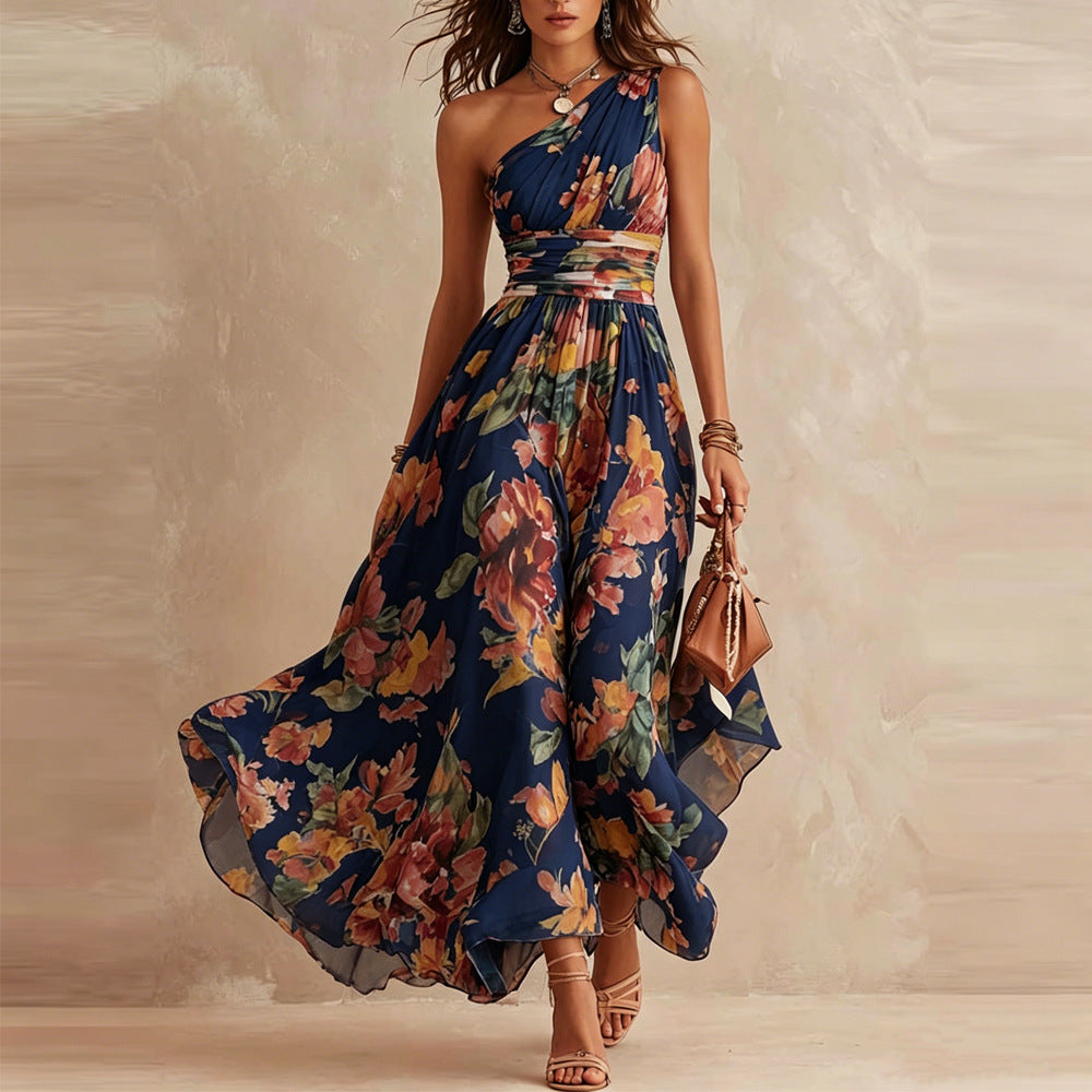 Robe longue femme Aurora de Danoir Paris, style monospalle avec motif floral, détail élégant et tissu fluide.