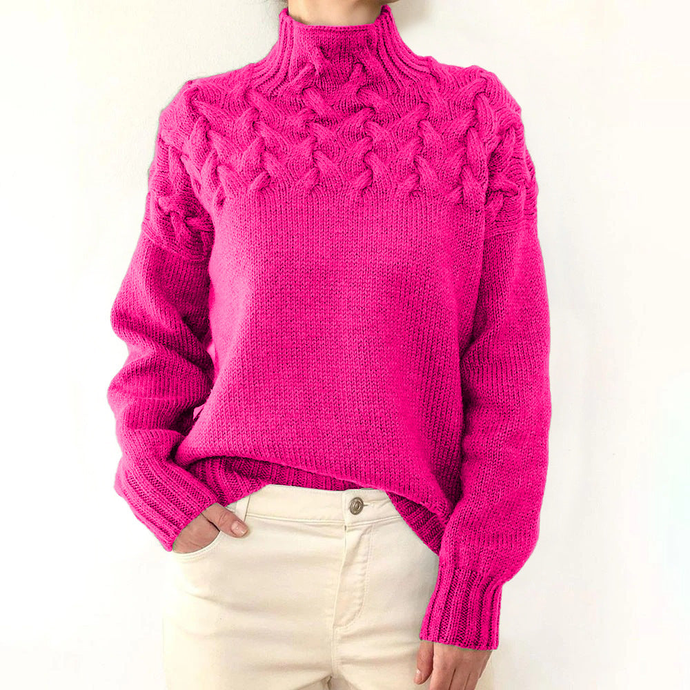 Pull col roulé chaud pour femmes Elena de Danoir Paris, en laine rose clair, porté sur mannequin.