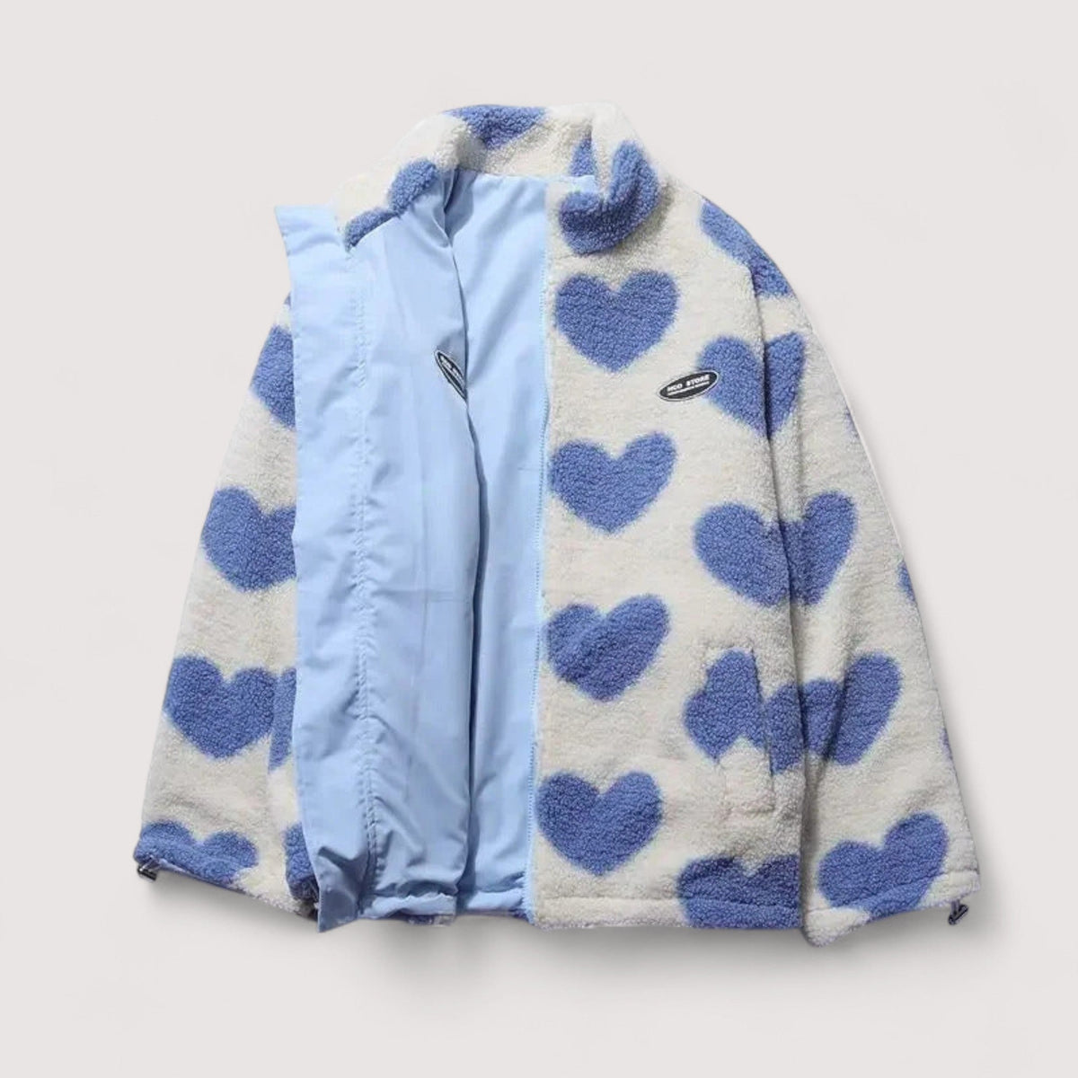 Veste réversible en forme de cœur Amélie de Danoir Paris, montrant les deux côtés colorés et sa coupe tendance.