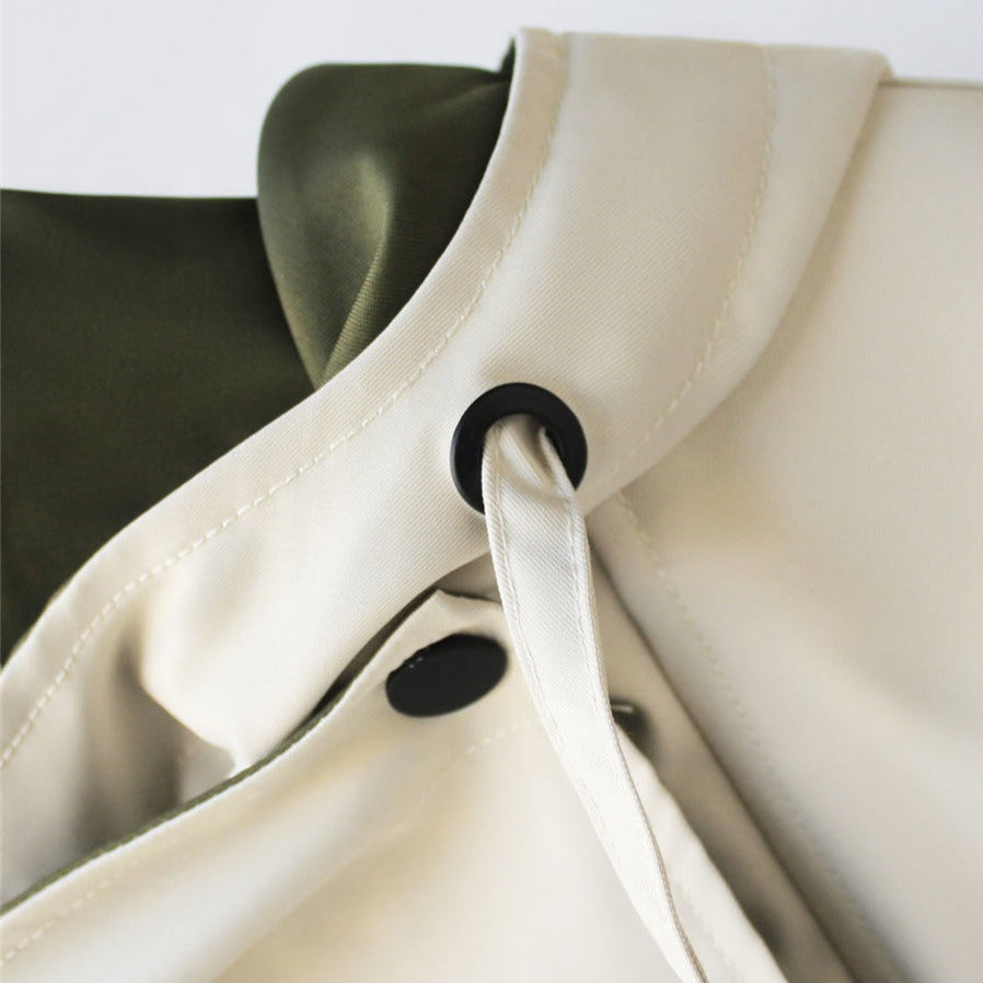 Veste élégante Danoir Paris Alvienne avec protection contre la pluie et le vent, en tissu imperméable et coupe sophistiquée.