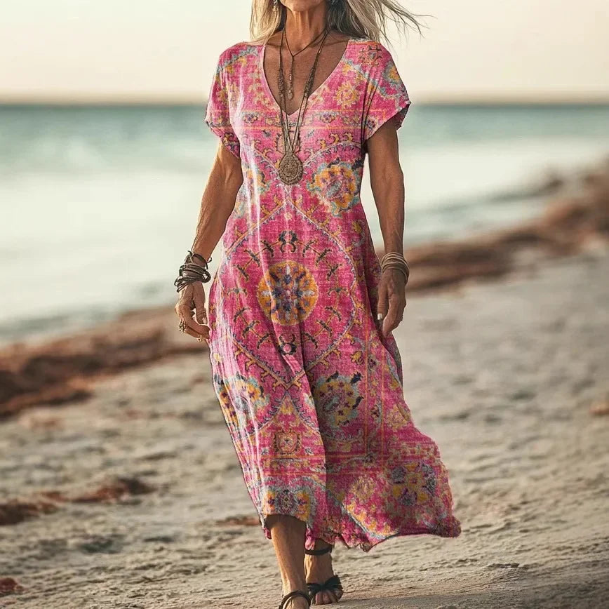 Isola - Robe longue à imprimés naturels et coupe aérienne